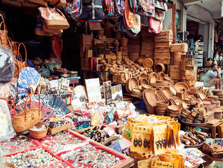 UBUD, BALI - MARCH 8: Typical souvenir shop selling souvenirs and handicrafts of at the famous Market - 117754514