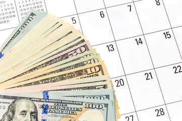 Dollar banknotes on the calendar