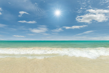 Fototapeta na wymiar tropical beach with clouds and sun reflection