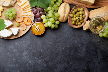 Fototapeta na wymiar Wine, grape, cheese and honey