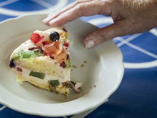 Hand With Cake Slice
