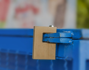 Padlocked on blue iron fridge