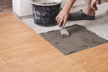 laying tiles on the floor