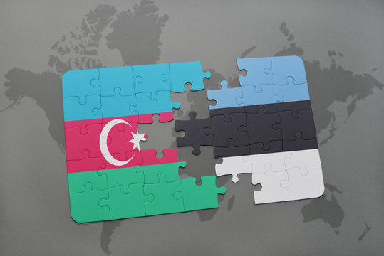 puzzle with the national flag of azerbaijan and estonia on a world map background.