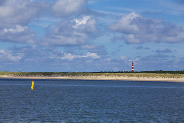 Obraz premium Leuchtturm Ameland aus der Ferne