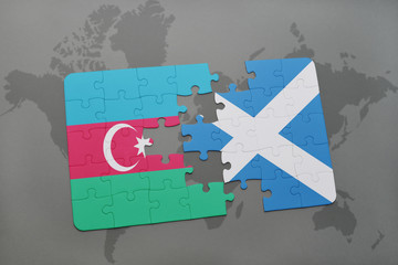 puzzle with the national flag of azerbaijan and scotland on a world map background.