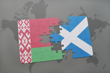 Fototapeta na wymiar puzzle with the national flag of belarus and scotland on a world map background.