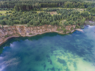 Obraz premium Blue laggon see from above in old sand mine in Poland.