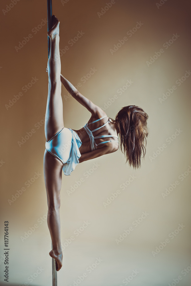 Sticker Young woman pole dancing