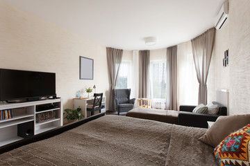 Big bedroom with large window