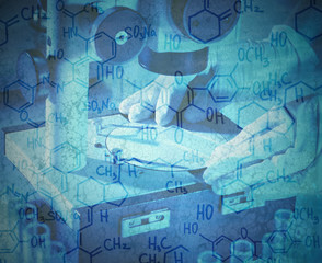 Scientist working with microscope