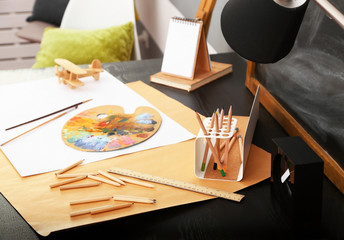 Workplace of creative person indoors