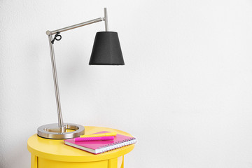 Design interior with lamp on white wall background
