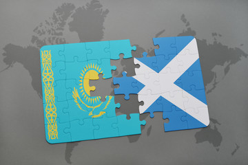 puzzle with the national flag of kazakhstan and scotland on a world map background.