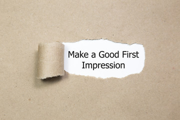 Make a Good First Impression message written under torn paper.