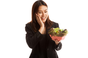 Healthy Asian business woman with salad.