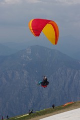 Paraglider in the mountains - obrazy, fototapety, plakaty