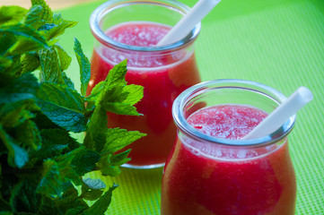 watermelon smoothie decorated with mint. 
