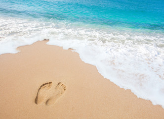 beach, wave and footprints
