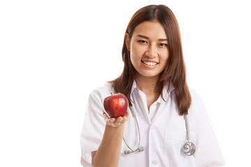 Young Asian female doctor show apple.