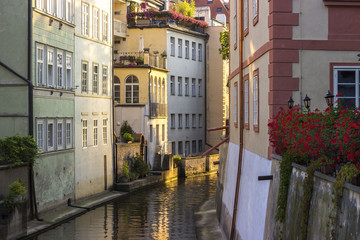 Obraz na płótnie Canvas Summer in Prague, sunny morning on the river Certovka