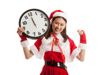 Asian Christmas Santa Claus girl  and clock at midnight.