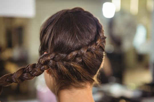 Rear view of woman with braids hairstyle