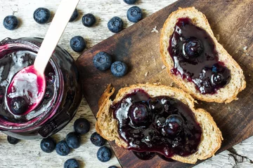 Foto op Plexiglas top view of healthy breakfast with blueberry jam © samael334