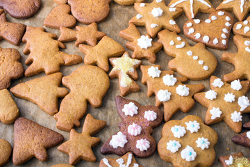 Colorful Christmas gingerbread cookies on  baking paper