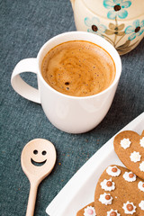 Cup of coffee and heart shaped cookies