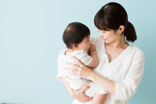 portrait of asian mother and baby