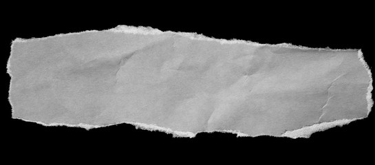 ripped in paper on black. Copy space