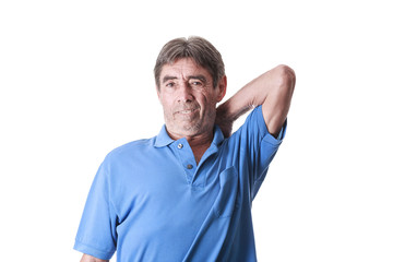 Portrait of senior man suffering with back pain