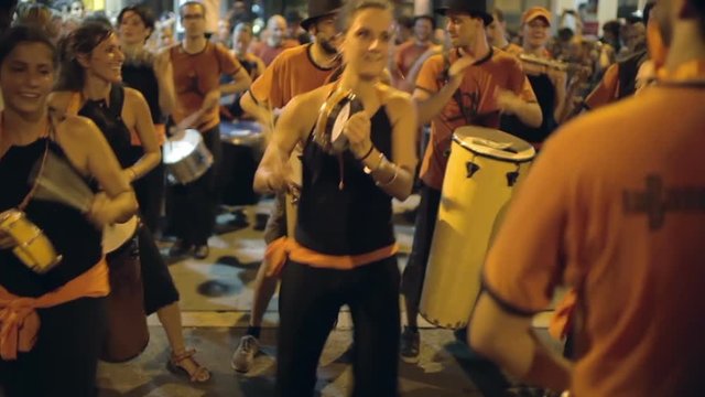 brazilian style drumers play during a street festival