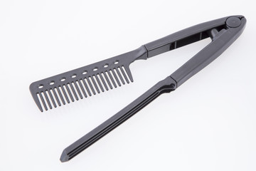 Comb hair care on white background