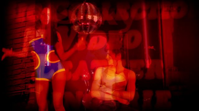 girl dances and teases around a man