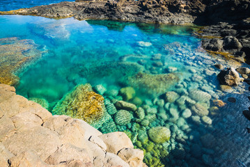 Naklejka na ściany i meble Incredible natural pool at the coastside of lanzarote in nature. Lanzarote. Canary Islands. Spain