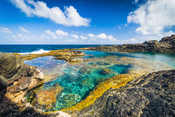 Incredible natural pool at the coastside of lanzarote in nature. Lanzarote. Canary Islands. Spain - obrazy, fototapety, plakaty