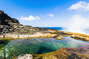 Fototapeta na wymiar Incredible natural pool at the coastside of lanzarote in nature. Lanzarote. Canary Islands. Spain