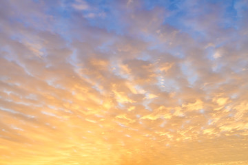 Early morning sky with colors from deep blue to orange.