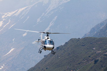 A helicopter transports passengers to the holy shrine of Kedarnath in the Himalayas.
