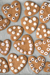 Heart shaped cookies on baking paper background