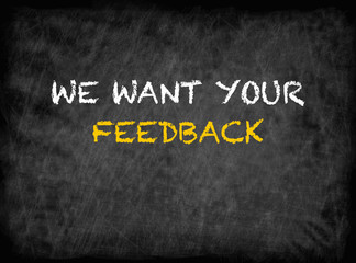 We Want Your Feedback - text on chalkboard