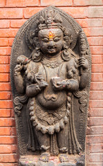 Fototapeta premium A sculpture of a Buddhist god in Svayambhunath, Nepal
