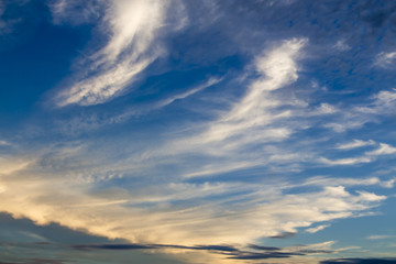 Sunset sky with beautiful streaks of clouds as natural background