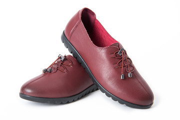 Beautiful vintage Pair of fashion woman leather shoes with front view profile, isolated on white background.