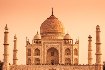 The Taj Mahal of India  with a warm color tone.