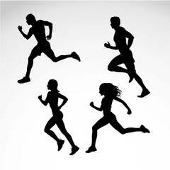 Silhouettes of runners