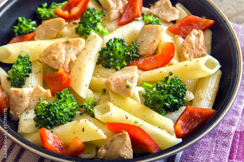 Sticker penne pasta with chicken and vegetables