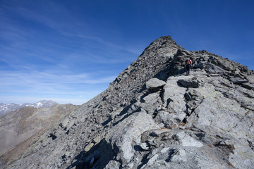 Climbing long the normal way to Grosser Moosstock in Ahrntal